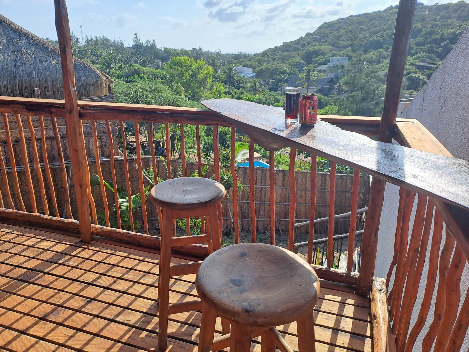 Corner bar nook with stools and ocean view